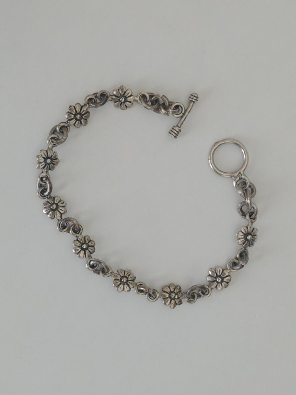 Sterling silver daisy flower bracelet with toggle clasp